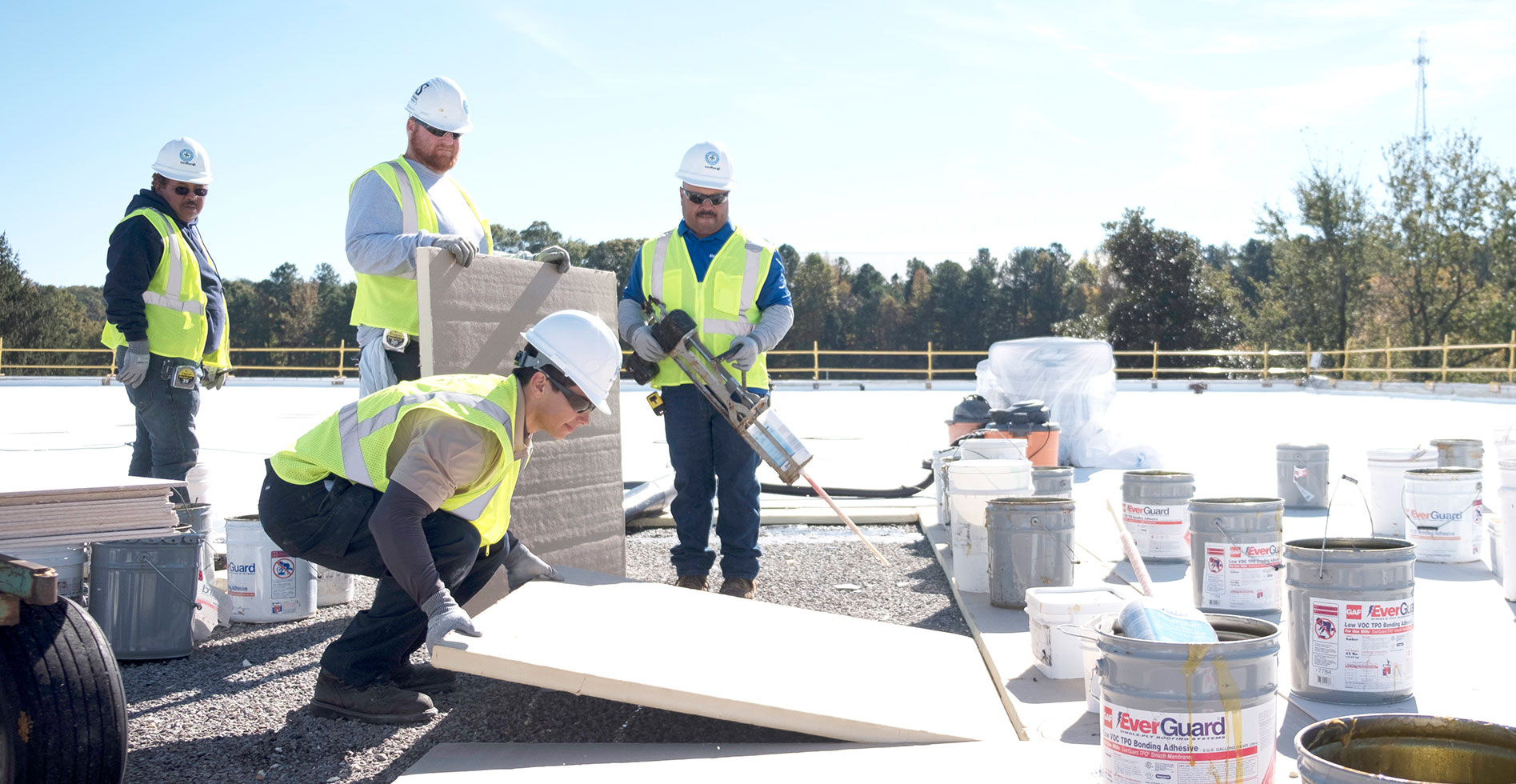 roofers installing a new roof